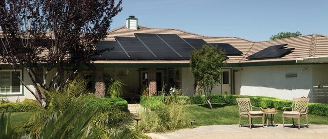 house with solar panels on roof