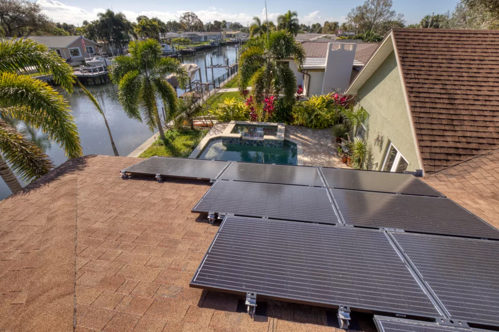 A top view of solar panels that are about to be replaced on a roof.
