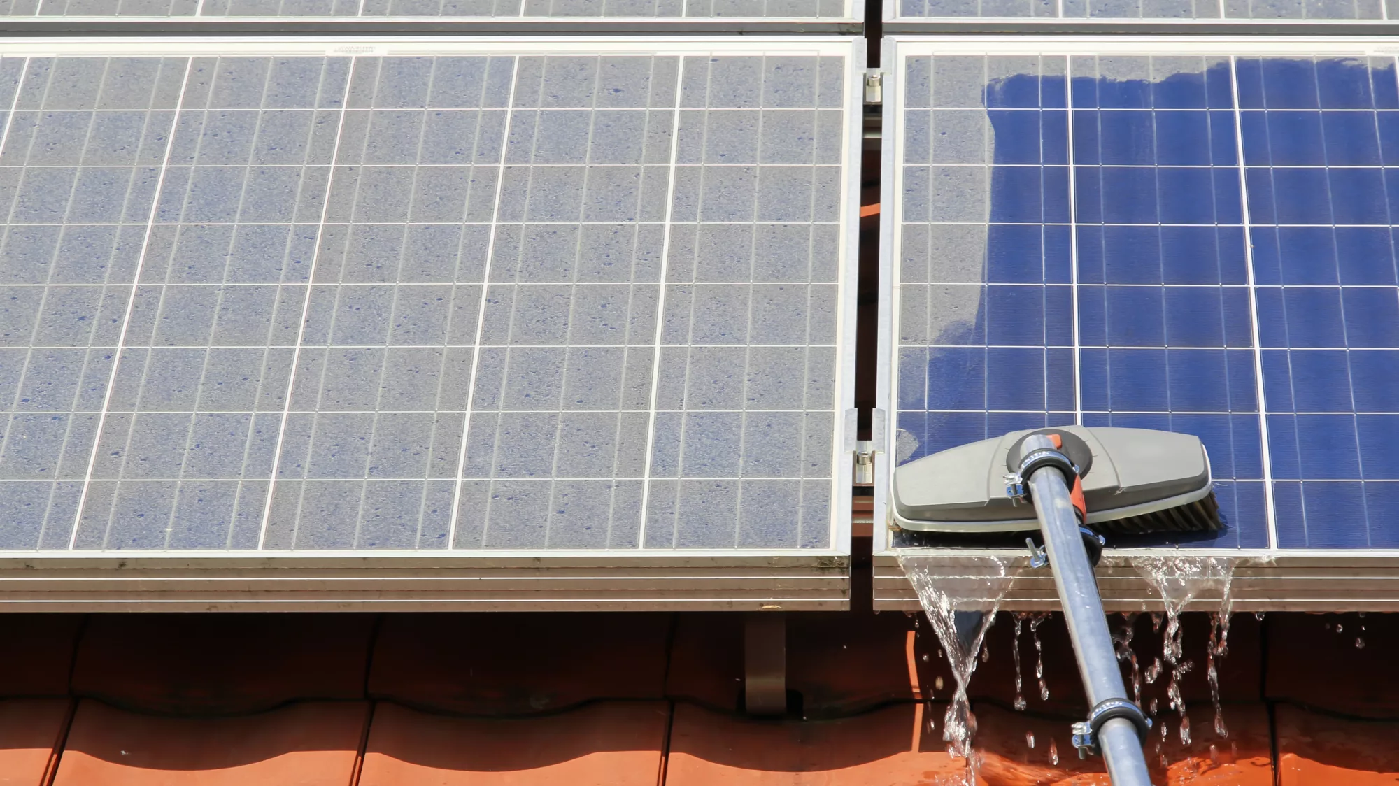 Solar panels receiving routine cleaning to maintain efficiency in the production of electricity